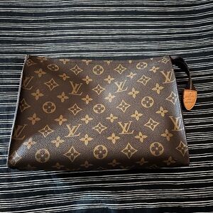 LV monogram toiletry clutch